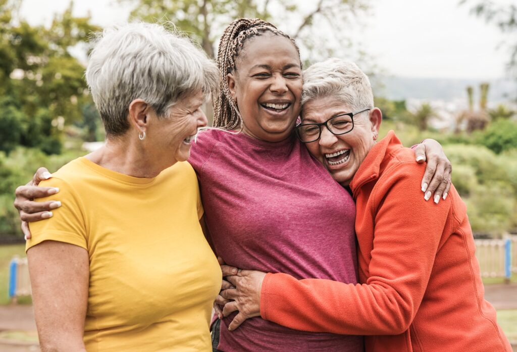 Three people laughing